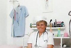 Cougar masturbation with a medical-instrument in uniforms