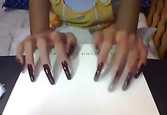 Long beautiful red fingernails